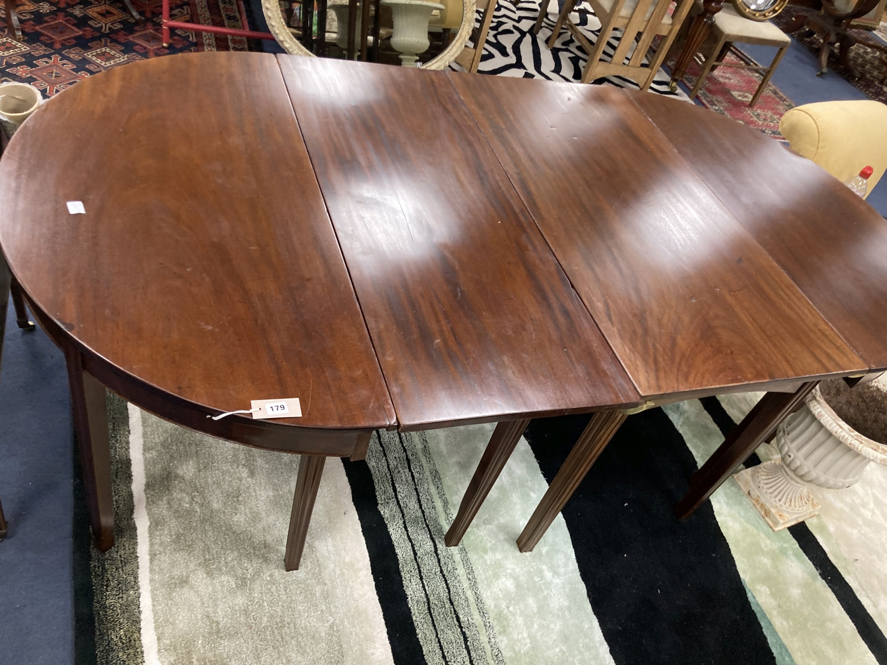A George III mahogany D end extending dining table. 220cm extended. W-118, H-71cm.